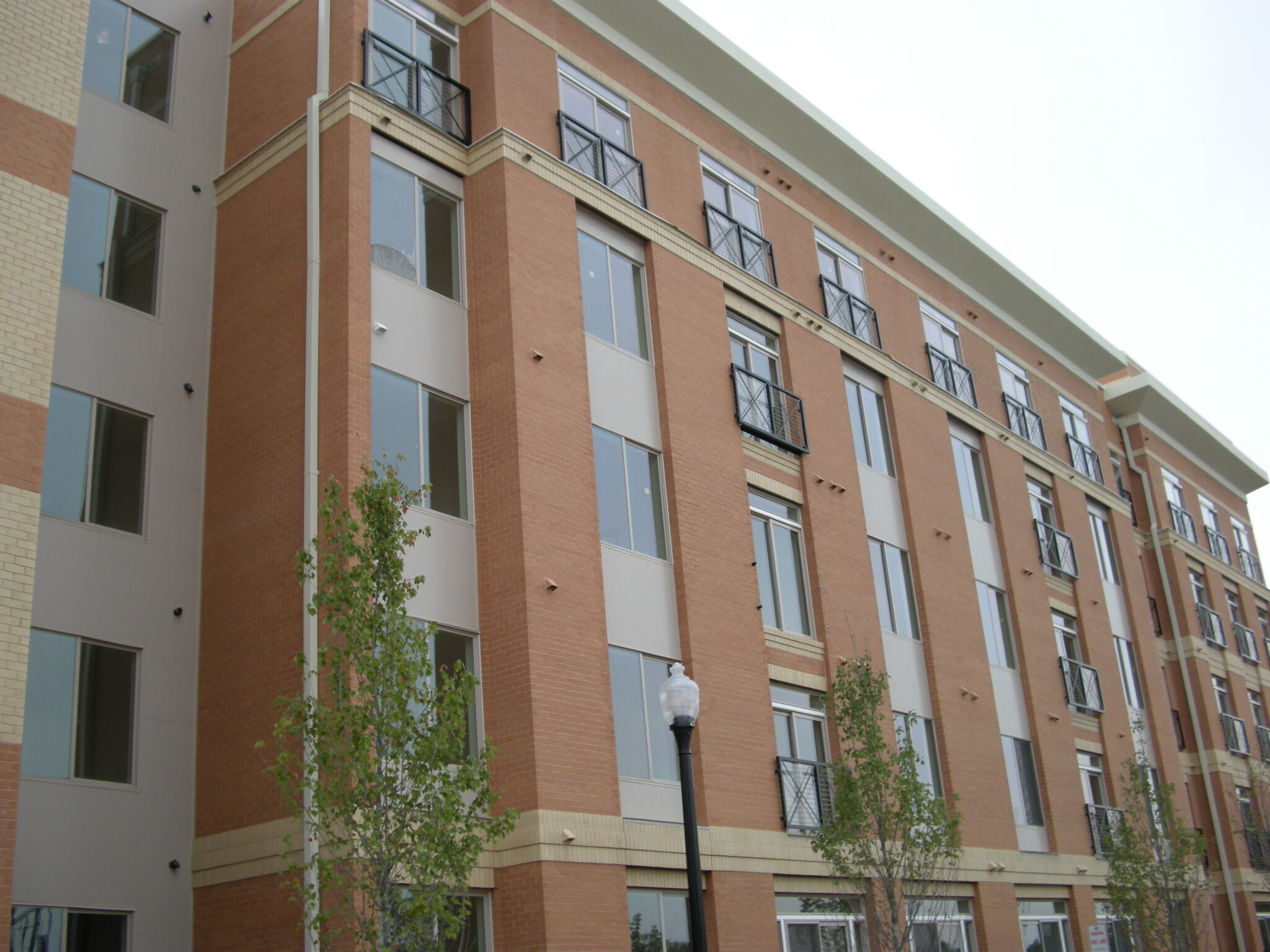 Alexan Carlyle Apartments Laminators Inc.